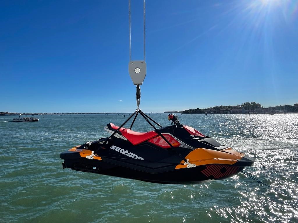 Jetski lifting sling safety system in use on superyacht
