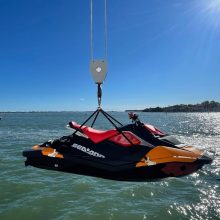 Jetski lifting sling safety system in use on superyacht